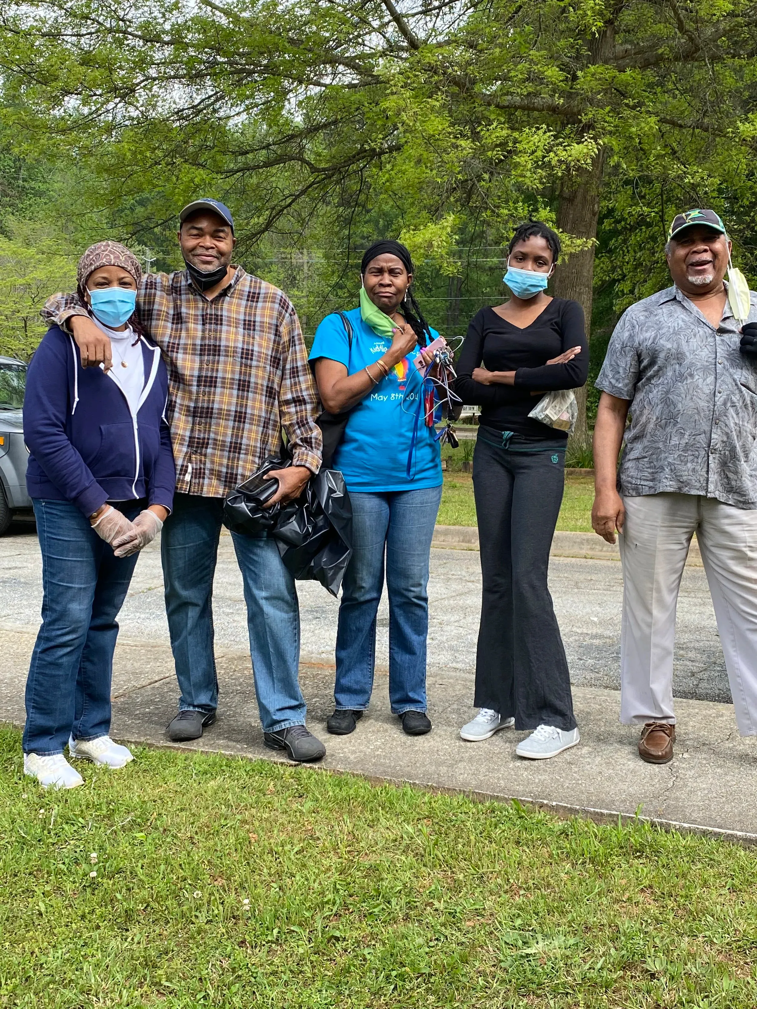 Church members gathered outside before an outreach