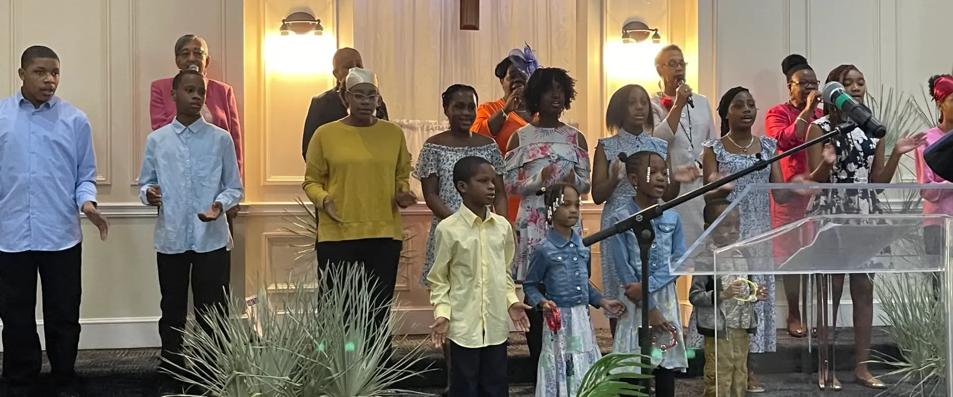 A family together at a church fellowship gathering in the hall